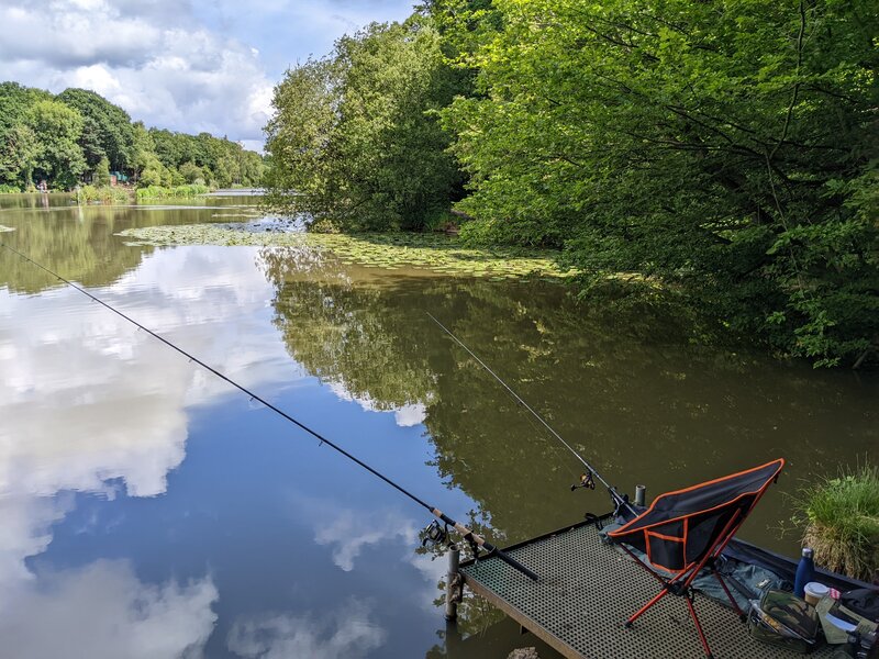 Two rods and a fishing chair overlooking Jacks Lake in North London