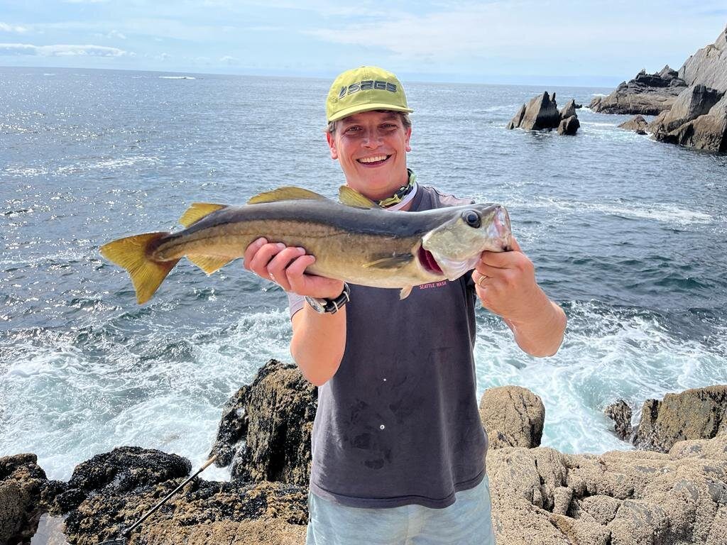 Hugo holding a pollock caught off the Beara Peninsula