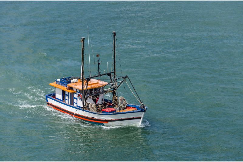 A small fishing vessel in the ocean