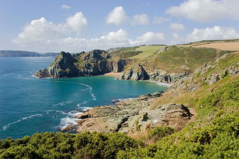 A classic sea view from the rugged South West Coastal Path in Devon