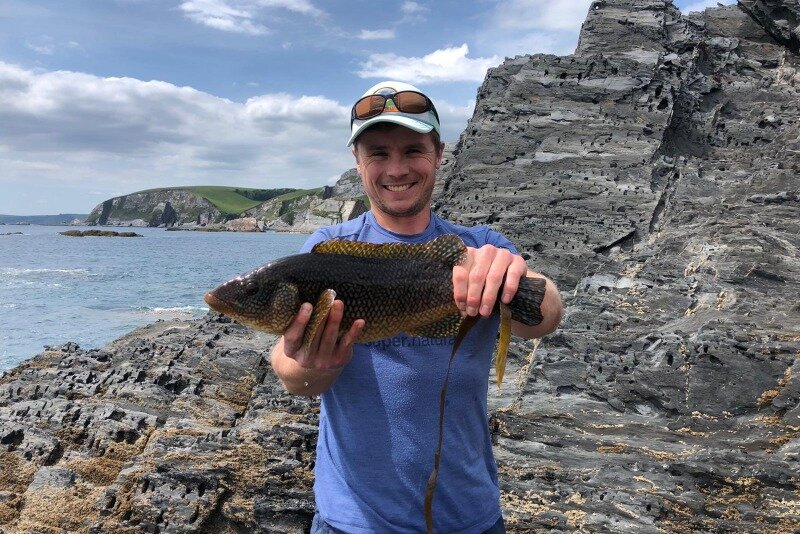 Stood on the rocks with a beautiful wrasse caught down near Noss Mayo 