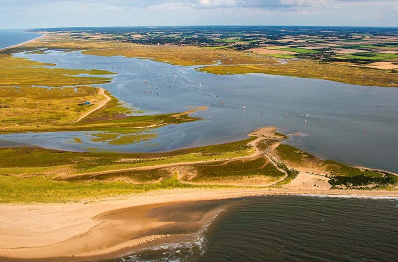 An aerial view of Blakeney Point and the shallow inlet and bay