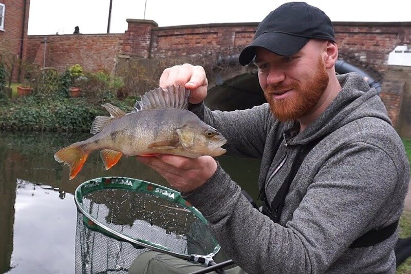 The Ginger Fisherman holding a big perch
