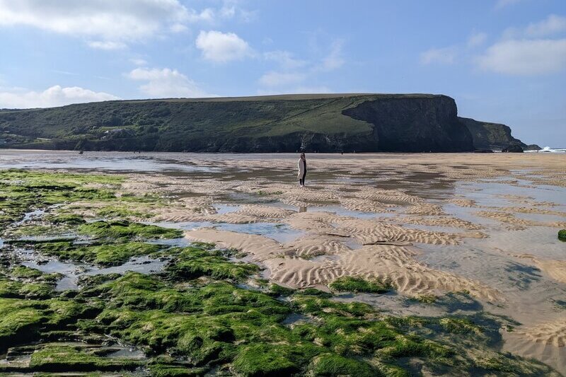 Mawgan Porth beach at low tide on a sunny autumnal day