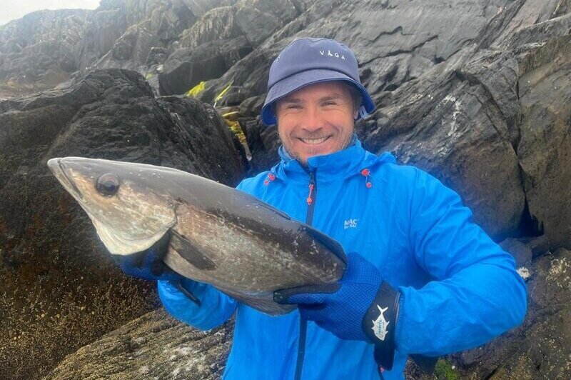 Me holding a huge shore caught pollock from Dursey Island